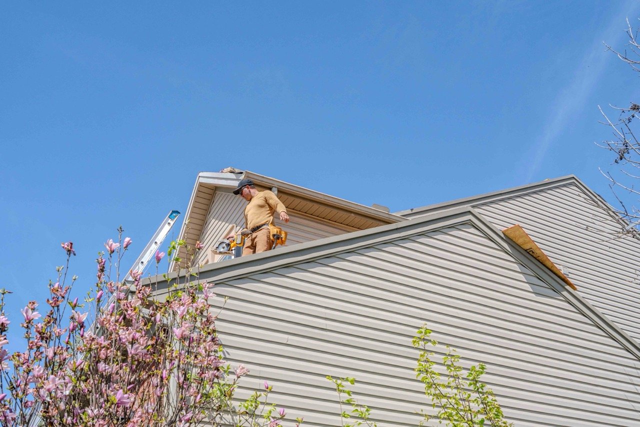 Deerfield Township Roofing assessing storm damage in Greater Cincinnati